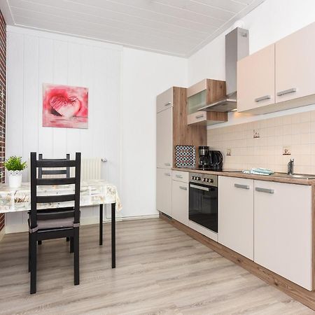 Ferienwohnungen Im Haus Waterkant Neuharlingersiel Exterior foto