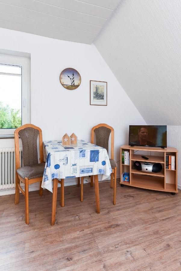 Ferienwohnungen Im Haus Waterkant Neuharlingersiel Exterior foto