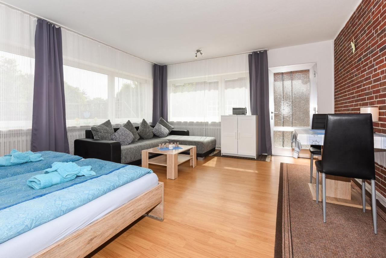 Ferienwohnungen Im Haus Waterkant Neuharlingersiel Exterior foto